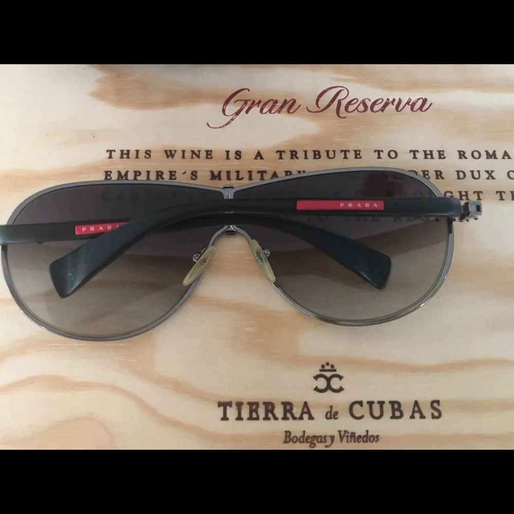 Prada Sunglasses.